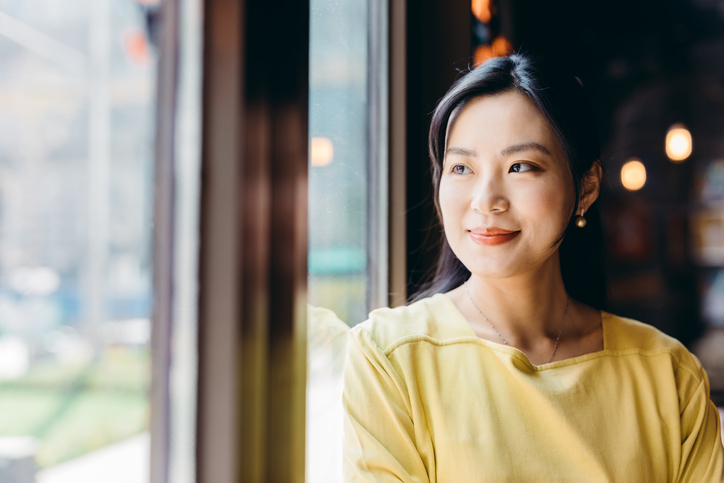 Woman in yellow shirt